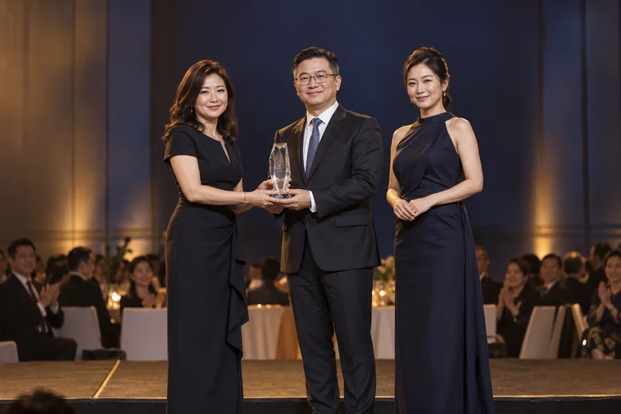 Award presentation at a corporate recognition ceremony