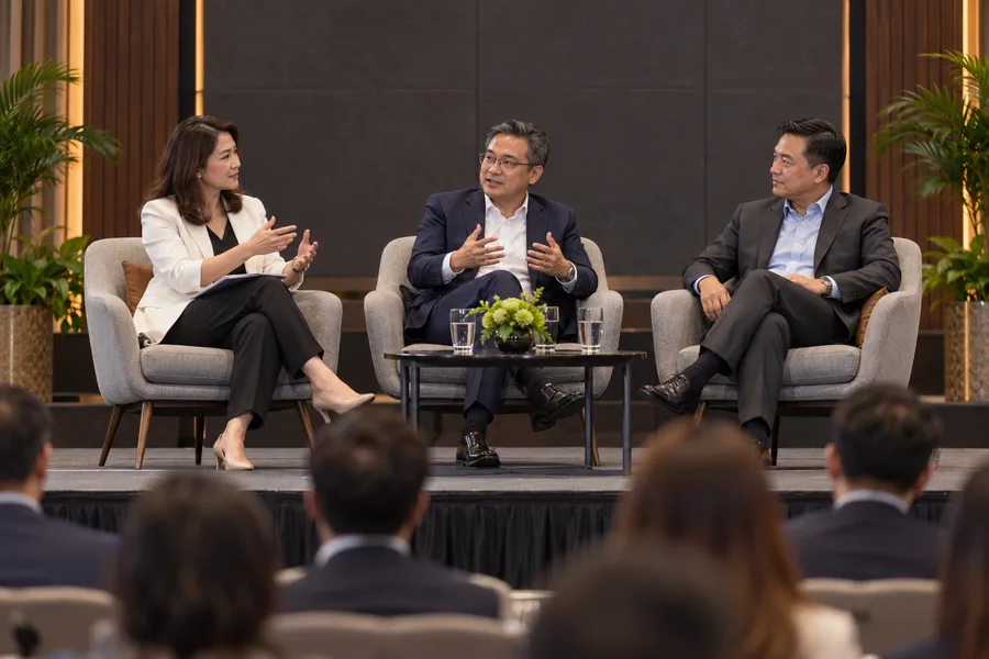 Panelists discussing a topic at an industry summit